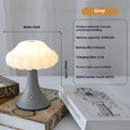 Mushroom-shaped touch control table lamp with USB charging port in wood grain finish.