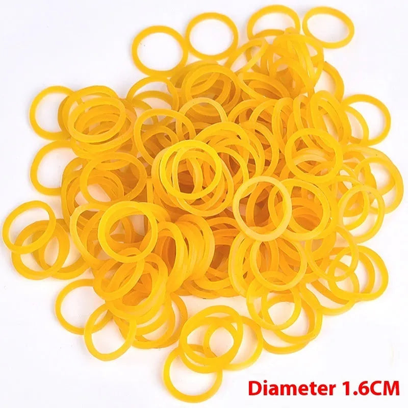 Yellow rubber bands bulk pack showing multiple diameters from 16mm to 70mm for office and packaging use