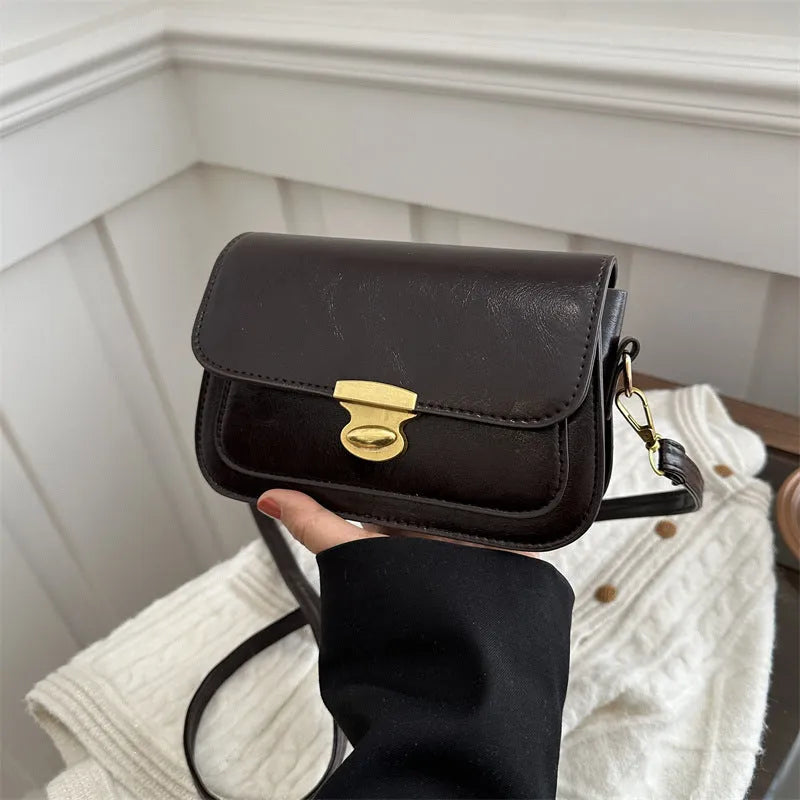 Retro square handbag in soft PU leather with horizontal suitcase shape design