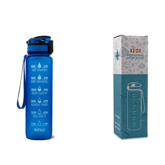 Blue and red gradient 1-litre Tritan sports water bottle with time markers, flip-top lid, and wrist strap.