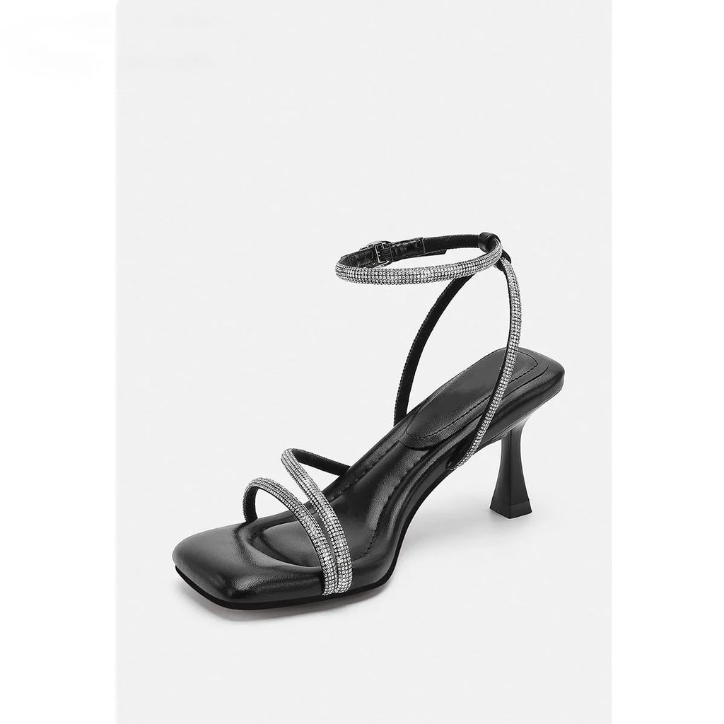 Women's silver rhinestone square-toe sandals with an ankle-strap buckle.