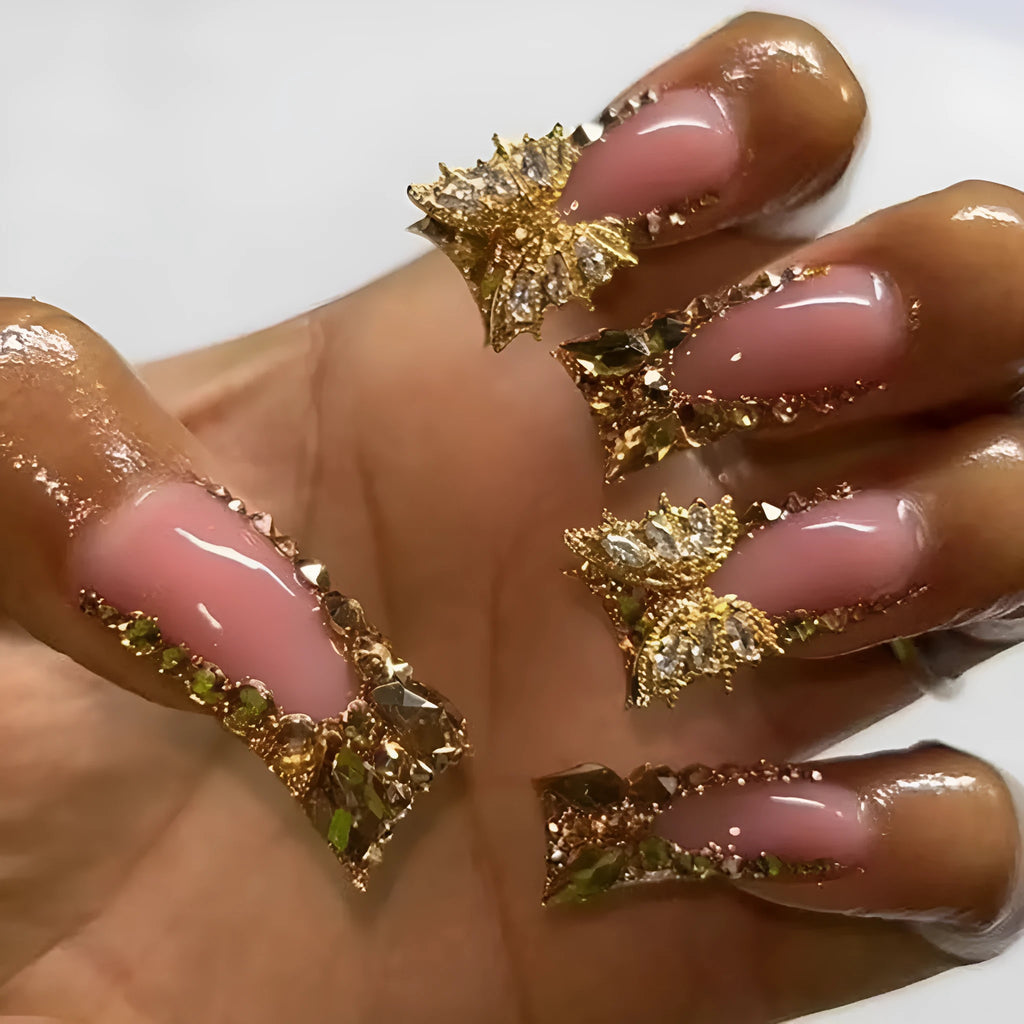 24 golden diamond and butterfly debris nail stickers in colour D34 with a tube of glue.