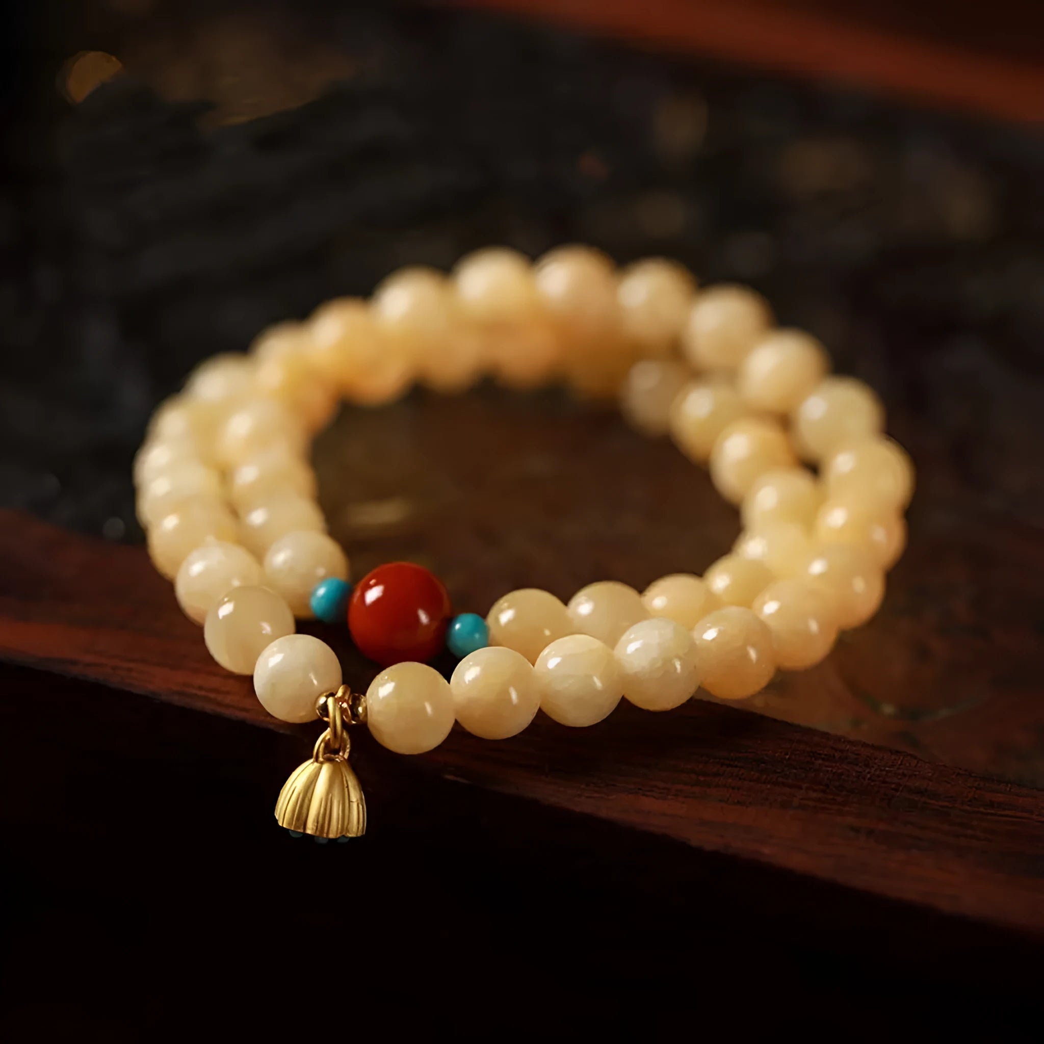 Handmade yellow jade topaz double ring bracelet with lotus seedpod design on 6mm or 8mm beads.