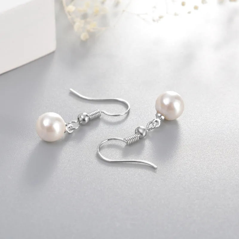 Women's white gold plated geometric high imitation pearl stud earrings on copper base