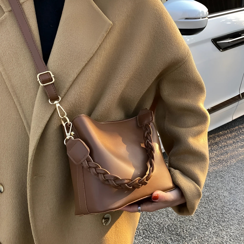 Khaki women's crossbody bucket bag with woven front texture and adjustable long strap