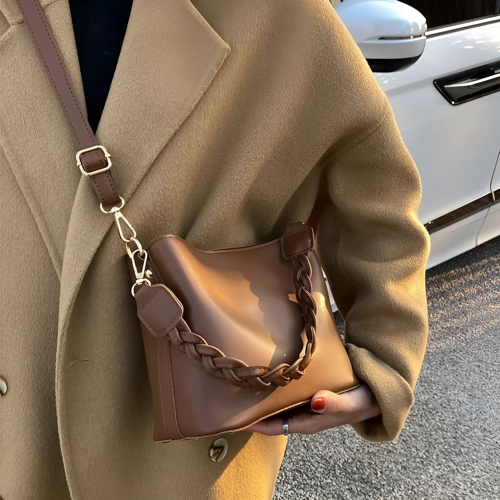 Khaki women's crossbody bucket bag with woven front texture and adjustable long strap
