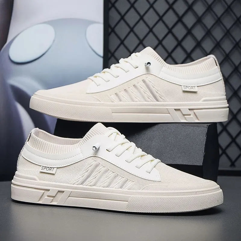 Men's casual skateboard shoes in solid colour with low top, flat heel, mesh lining, and injection-moulded sole