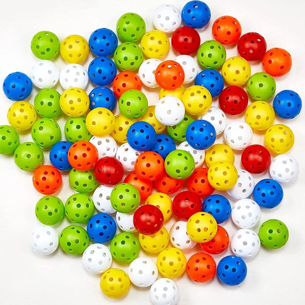 Multi-colour golf practice balls in red, orange, blue, green, white, and yellow shown in a net bag.