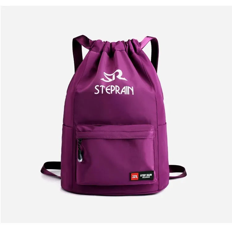 Lightweight solid colour Oxford cloth backpack with drawstring closure and double shoulder straps.