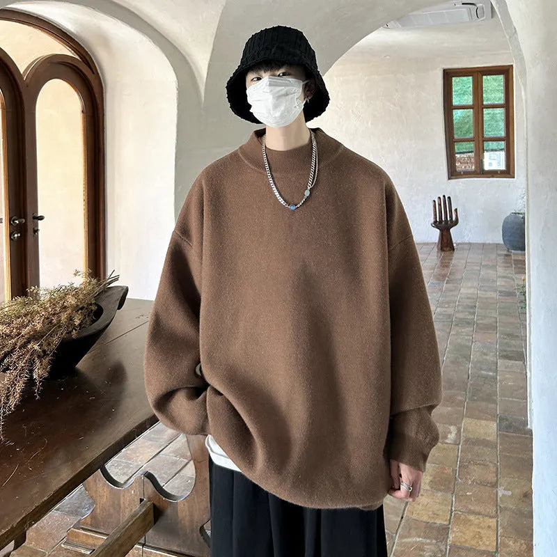 Men's loose-fitting round neck pullover sweater in solid colour with long sleeves