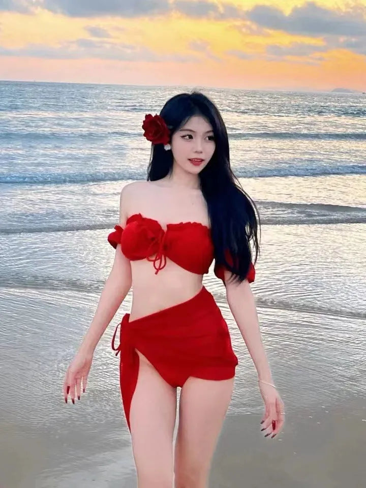 Women's red bikini swimsuit with puff sleeve skirt detail and matching briefs
