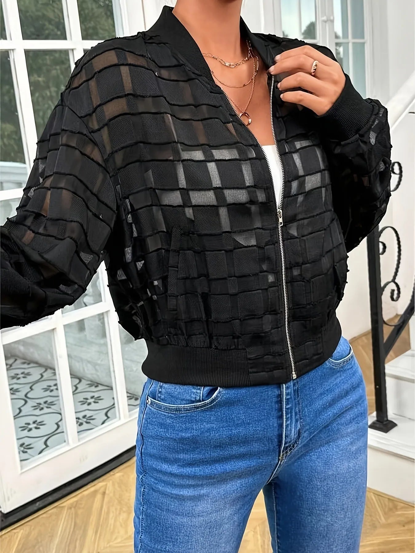 Black women's casual jacket with geometric pattern and thread zipper in semi-transparent polyester