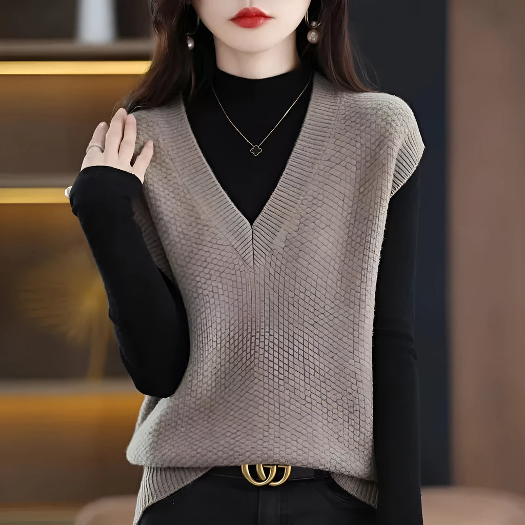 Women's beige V-neck sleeveless knitted vest with a raised 3D pattern texture