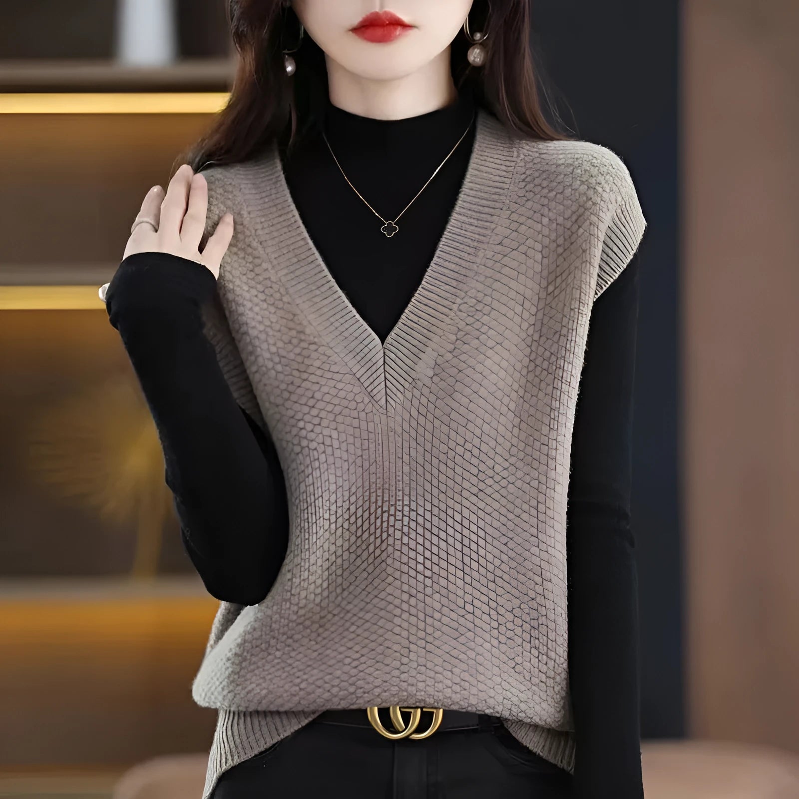 Women's beige V-neck sleeveless knitted vest with a raised 3D pattern texture