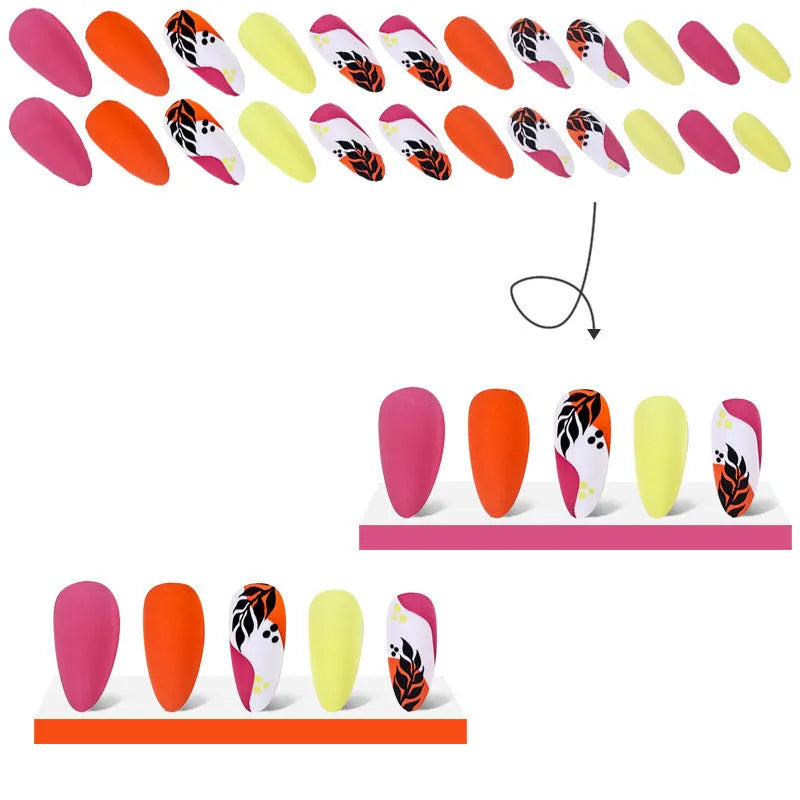 Wear Armour medium almond frosted nail stickers showing French leaves, leopard print, plating, and macaron designs