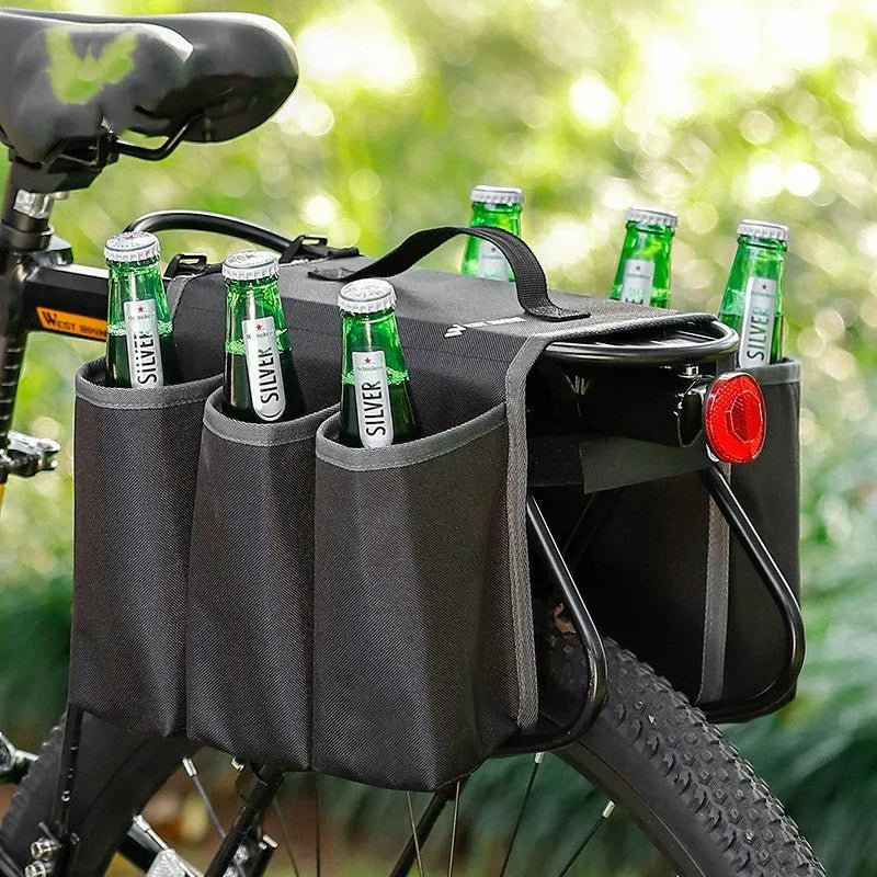 Black bicycle drink cage storage bag mounted on a bottle cage, showing its 2-litre capacity and scratch-resistant side panels.