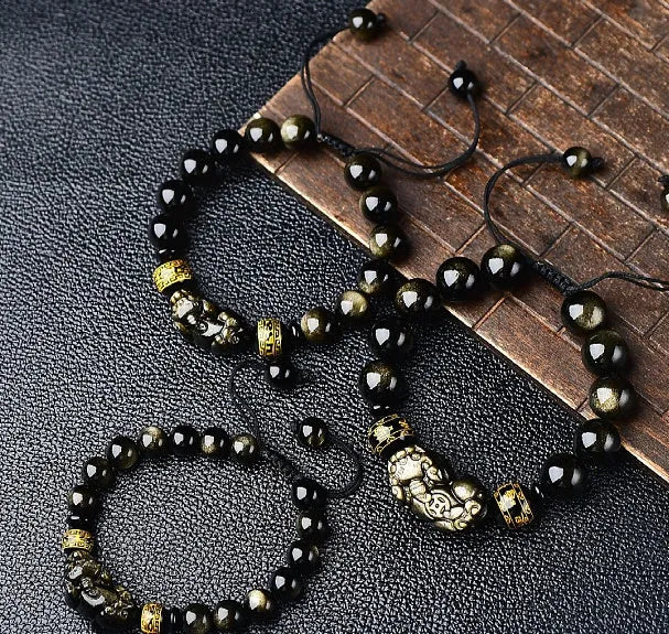 Hand-woven golden obsidian Pi Xiu bracelet with zodiac design in multiple bead sizes
