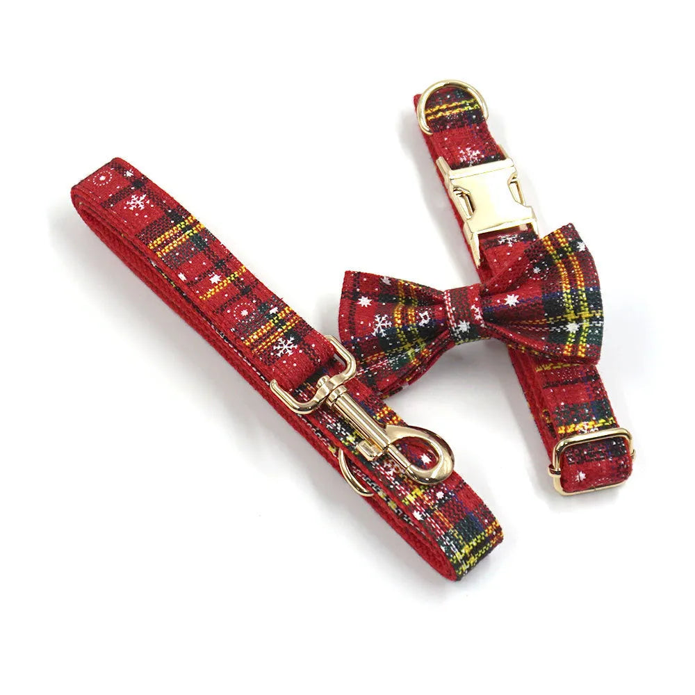 Red Christmas pet collar, leash, harness, bow, and waste bag set with laser-cut fabric design.