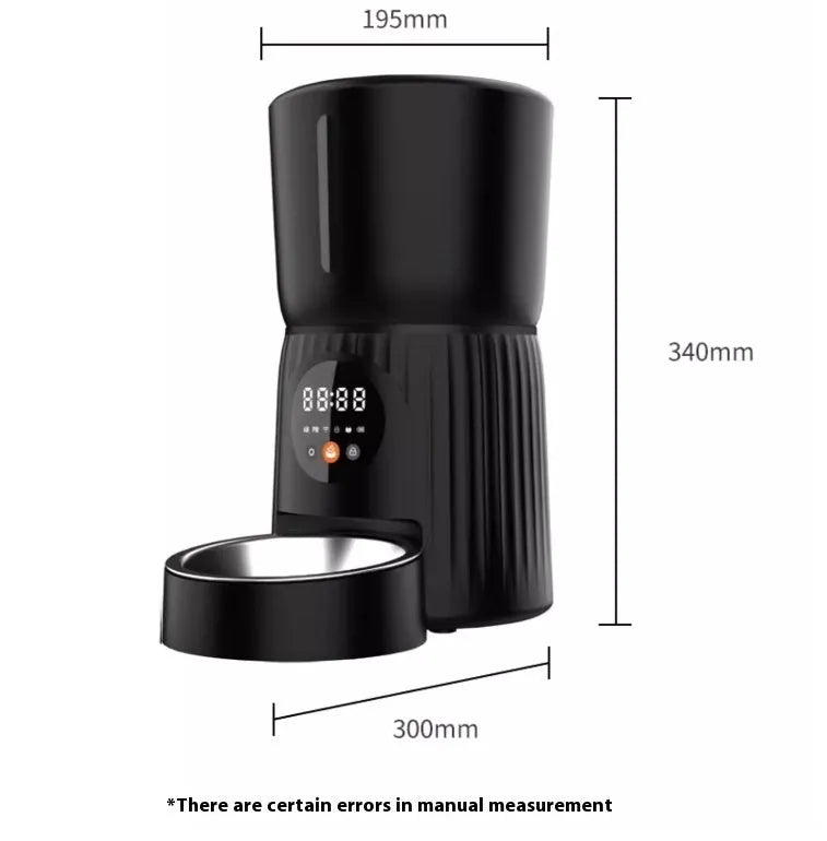 Black and white automatic pet feeder with digital display, food hopper, and USB cable.