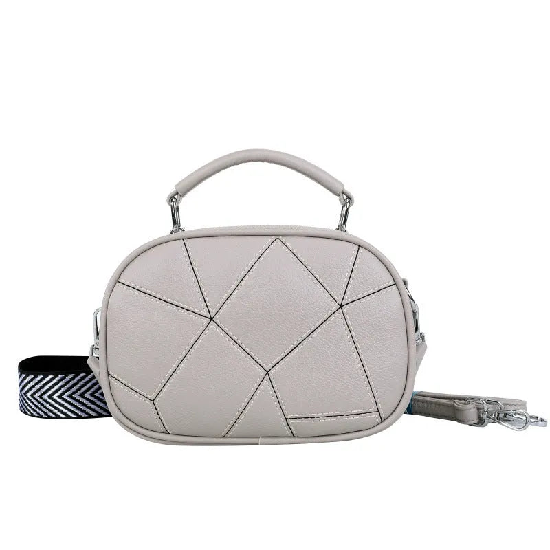 Round grey retro patchwork PU leather crossbody bag with stitching details