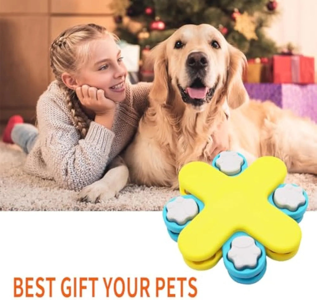 Yellow three-layer rotating dog puzzle feeder toy with anti-slip rubber base on a floor.