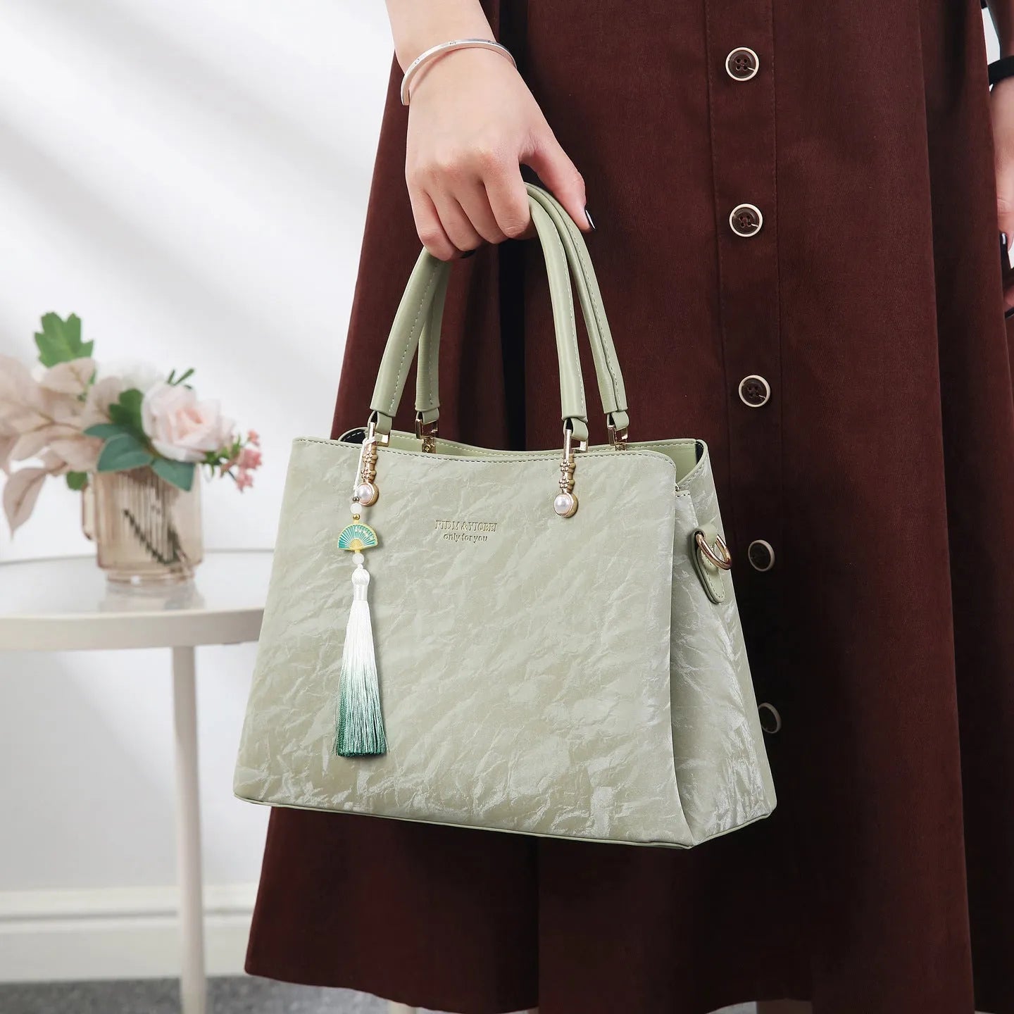 Women's large square shoulder bag in PU leather with a slit pocket, shown in beige colour.