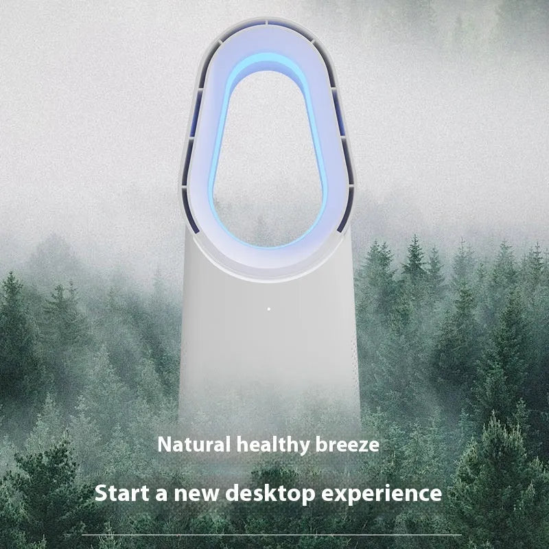 White bladeless tower fan with remote control on wooden floor