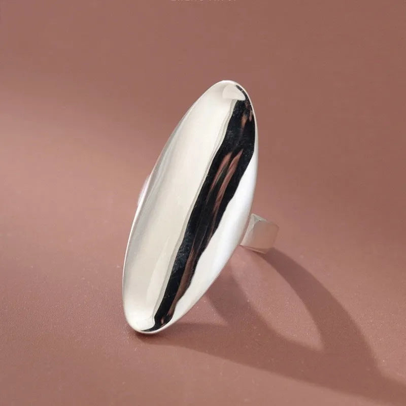 Geometric open ring for women in glossy electroplated silver tone on copper, adjustable band