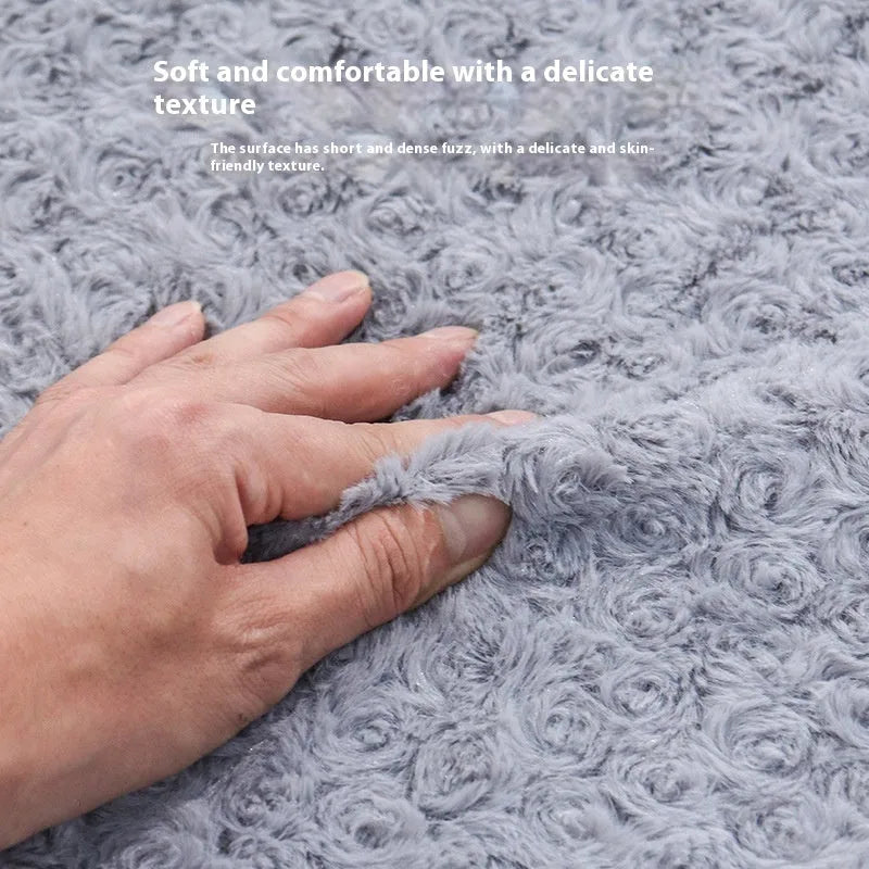 Grey soft-sided dog kennel bed with raised edges, shown in a home setting.