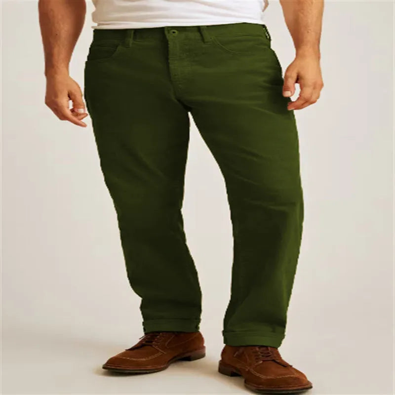 Straight-leg corduroy trousers in a loose casual fit on a mid-waist, shown in army green colour.