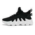 Men's black low-top sock-like sports shoes with a lace-up front and wear-resistant sole on a white background.