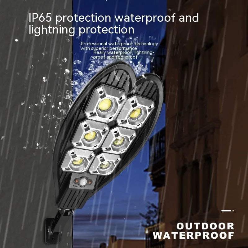Outdoor solar garden lamp with 6-eye sword design and remote control on a grassy pathway.