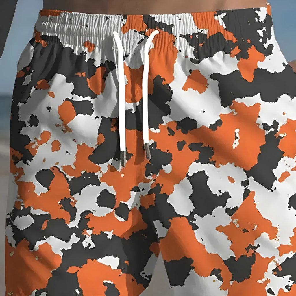 Men's polyester beach shorts with elastic waistband and printed streetwear design in multiple colour options