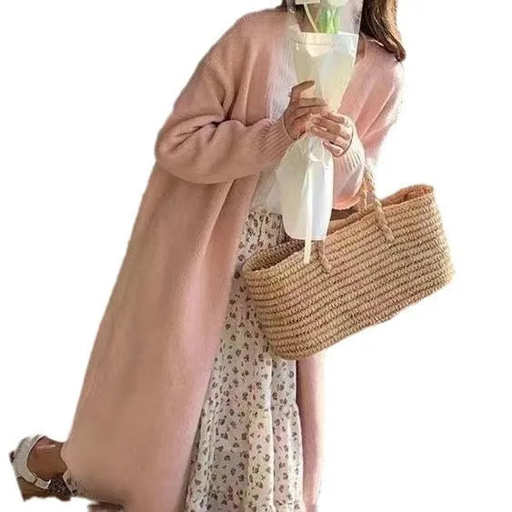 Women's khaki knitted V-neck cardigan with long sleeves, shown on a hanger.