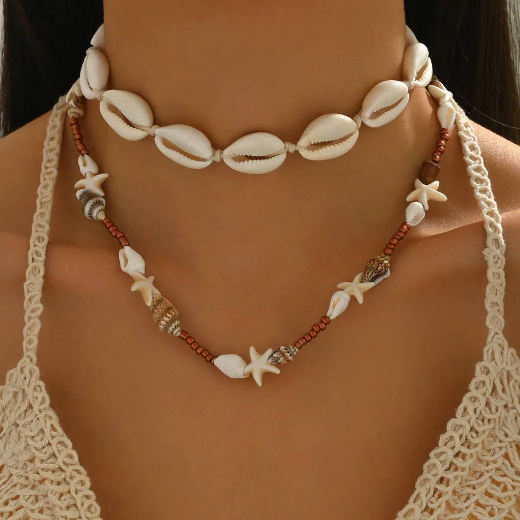 Women's geometric shell necklace with natural pendant on regular chain, colour X1900