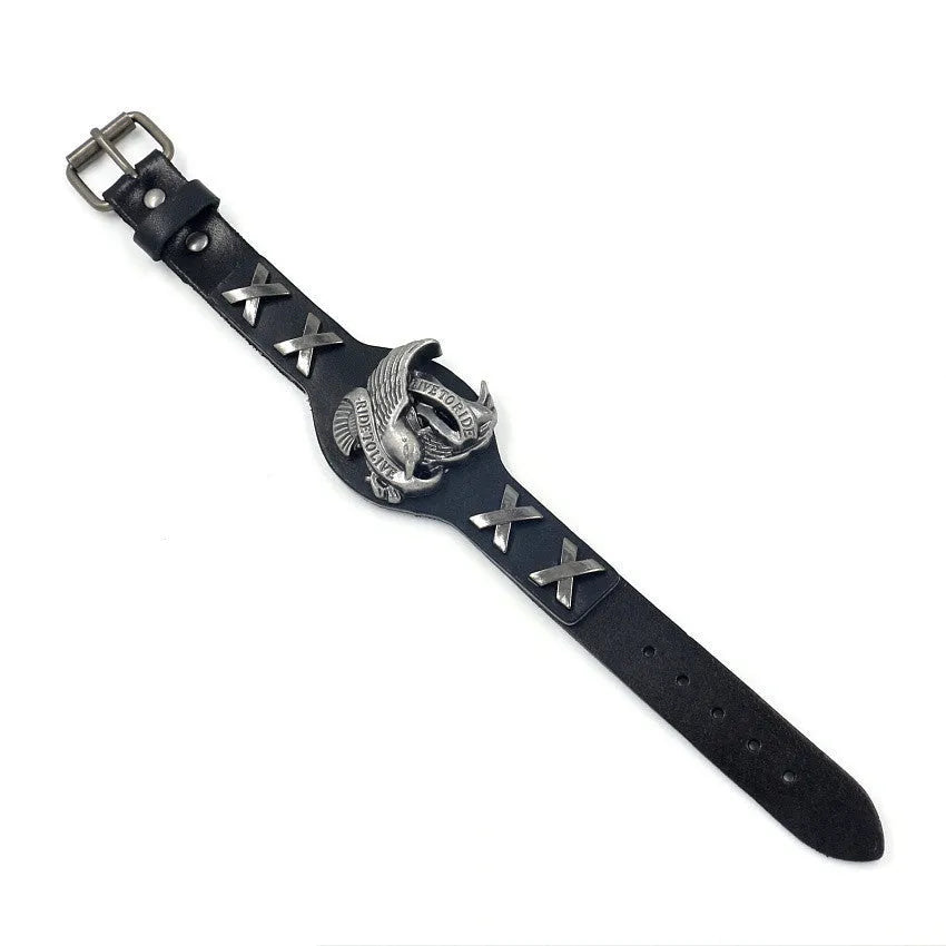 Black leather bracelet with a geometric alloy eagle decoration, showing the band's width variation.