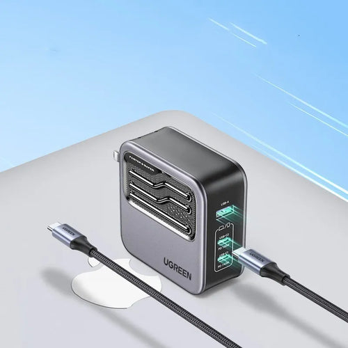 Compact 100W Gallium Nitride fast wall charger plug with multiple USB-C ports