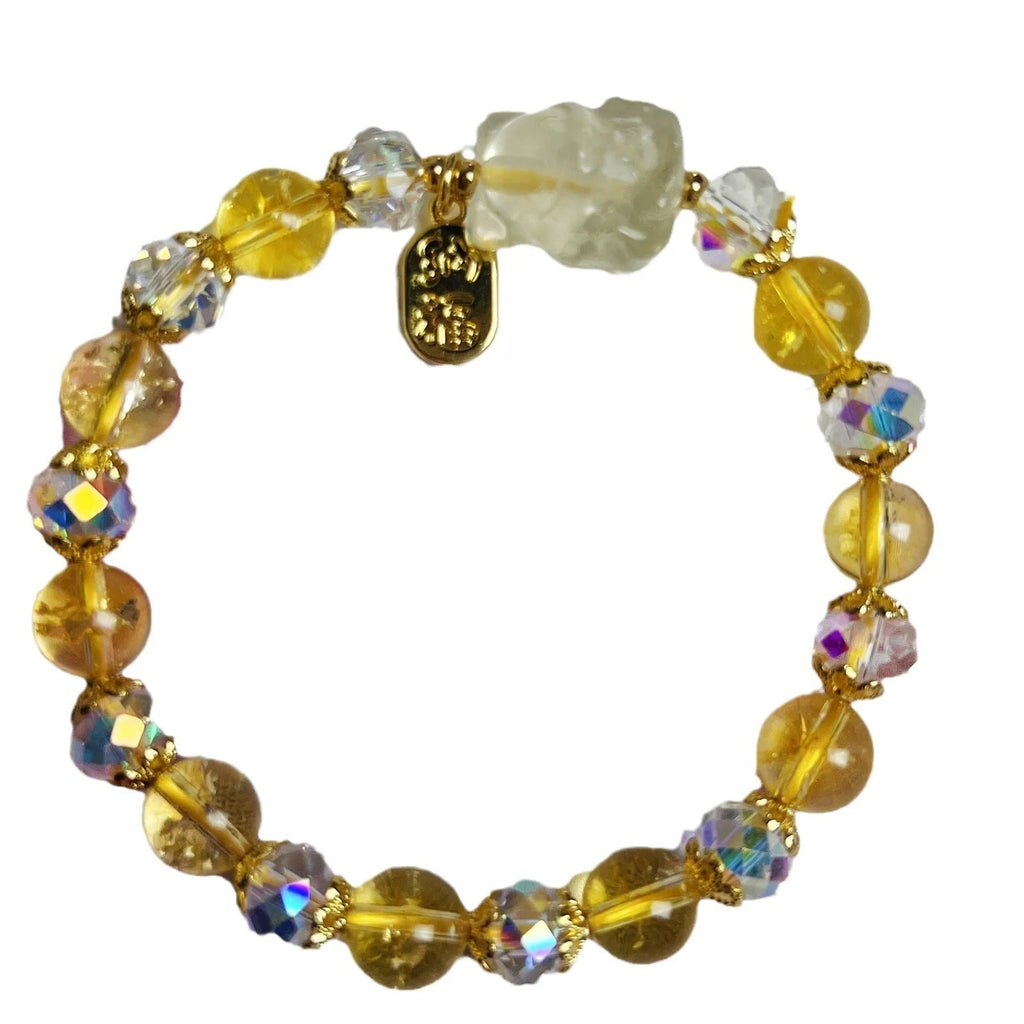 Women's crystal bracelet with a detailed nine-tail fox charm in natural citrine.