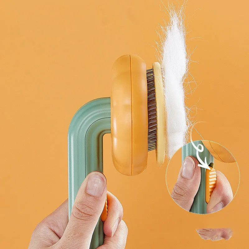 Pet grooming brush with curved steel wire teeth in white or pumpkin colour for cats and dogs