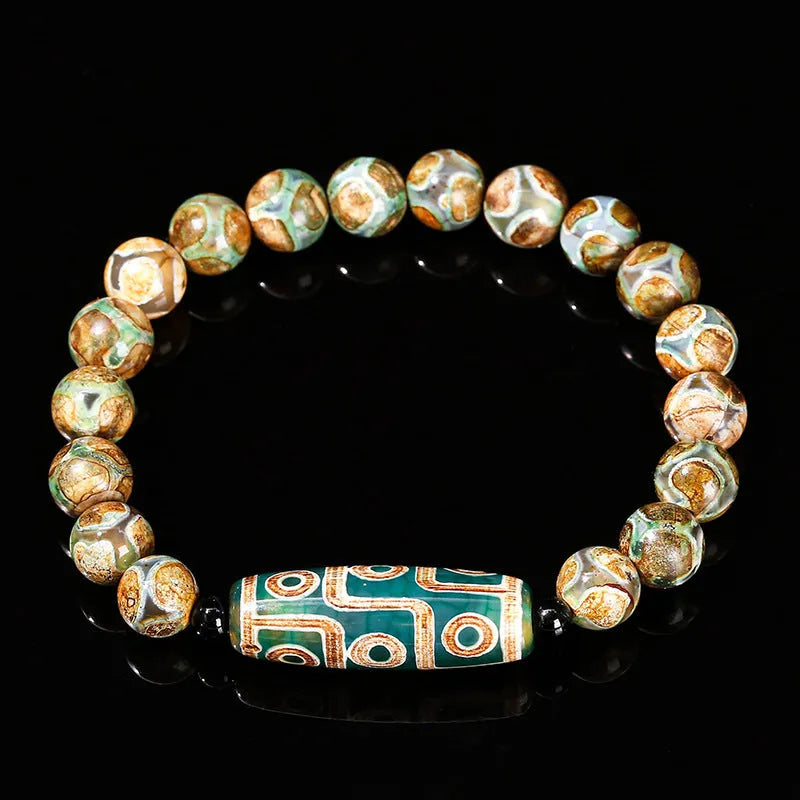 Handmade barrel shaped Dzi bead bracelet in green with geometry design