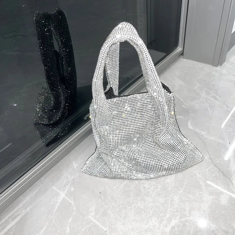 Silver evening handbag with shiny rhinestones and open pocket design made from cotton thread
