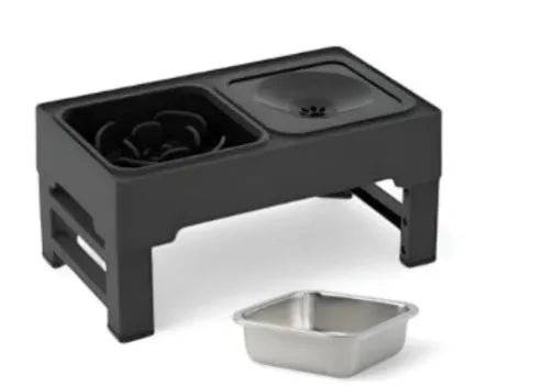 Black adjustable height dog feeding stand with two stainless steel bowls elevated on plastic stand