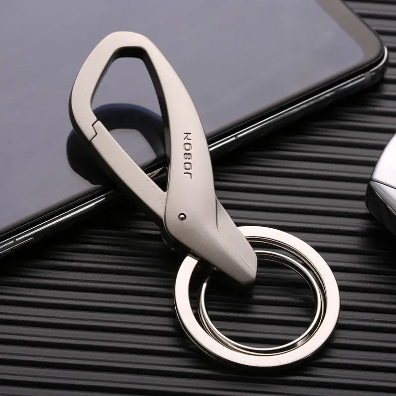 Zinc alloy car key waist hanging double ring keychain in black, chrome, or nickel colour, measuring 8.3 by 3.5 cm.