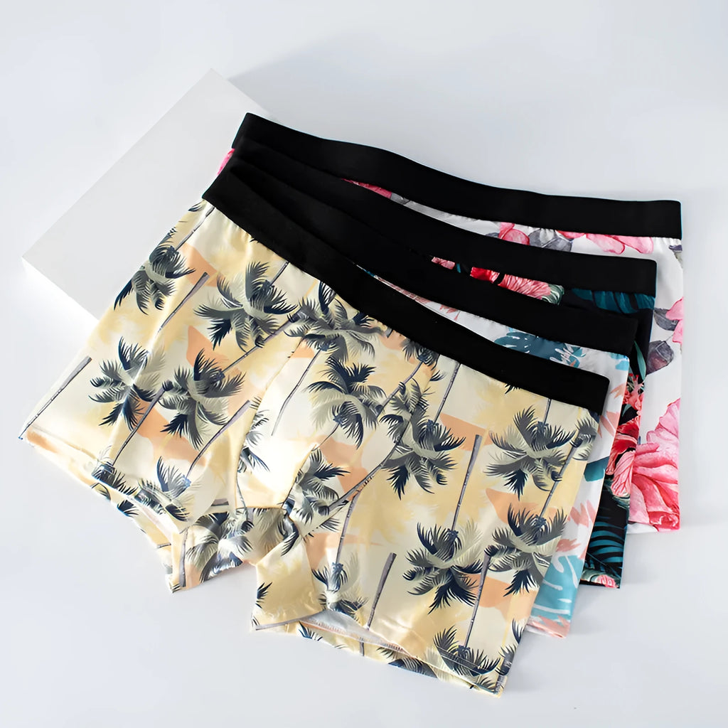 Ice silk men's underwear with fashion printing patterns and mid-waist design on breathable polyester fabric