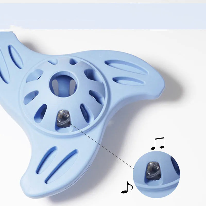 Blue boomerang-shaped molar dog chew toy for medium and large breed dogs on a plain background