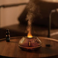 Colourful flame simulation aroma diffuser humidifier in black resin with LED lighting effect