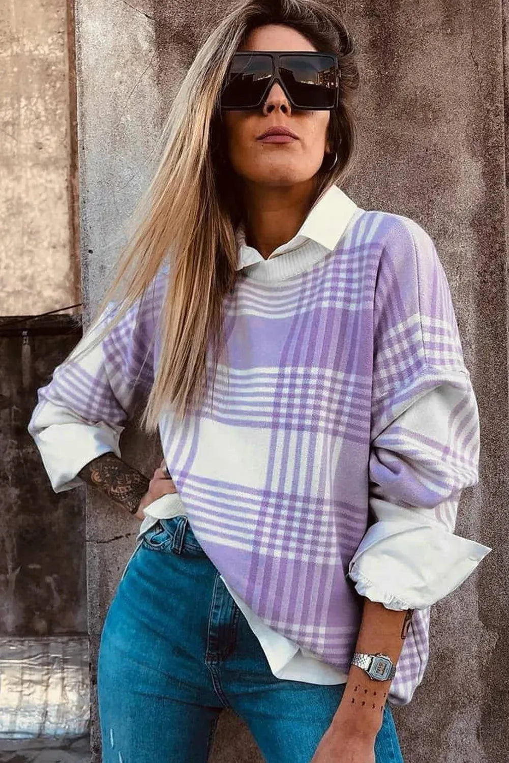 Lilac plaid print loose sweater with ribbed trim on the cuffs and a relaxed fit.