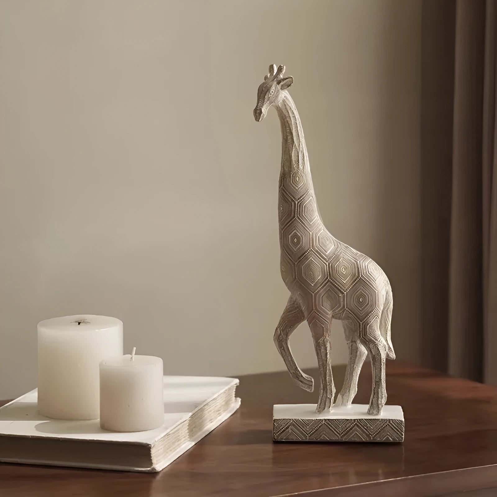 Wood colour European style giraffe resin ornament on a surface.