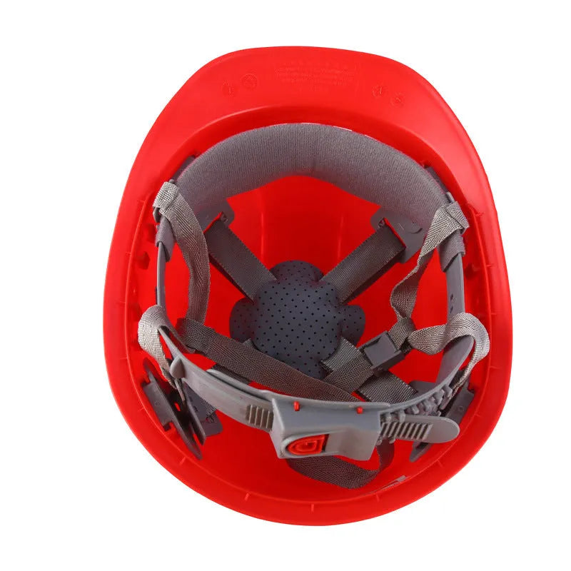 Construction safety helmet in red with adjustable rear hoop and vent holes