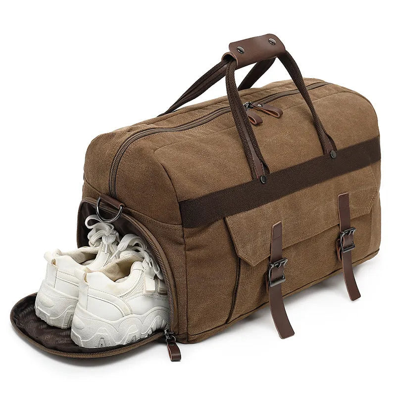 Men's large canvas crossbody travel bag in a retro style, shown in a solid colour.